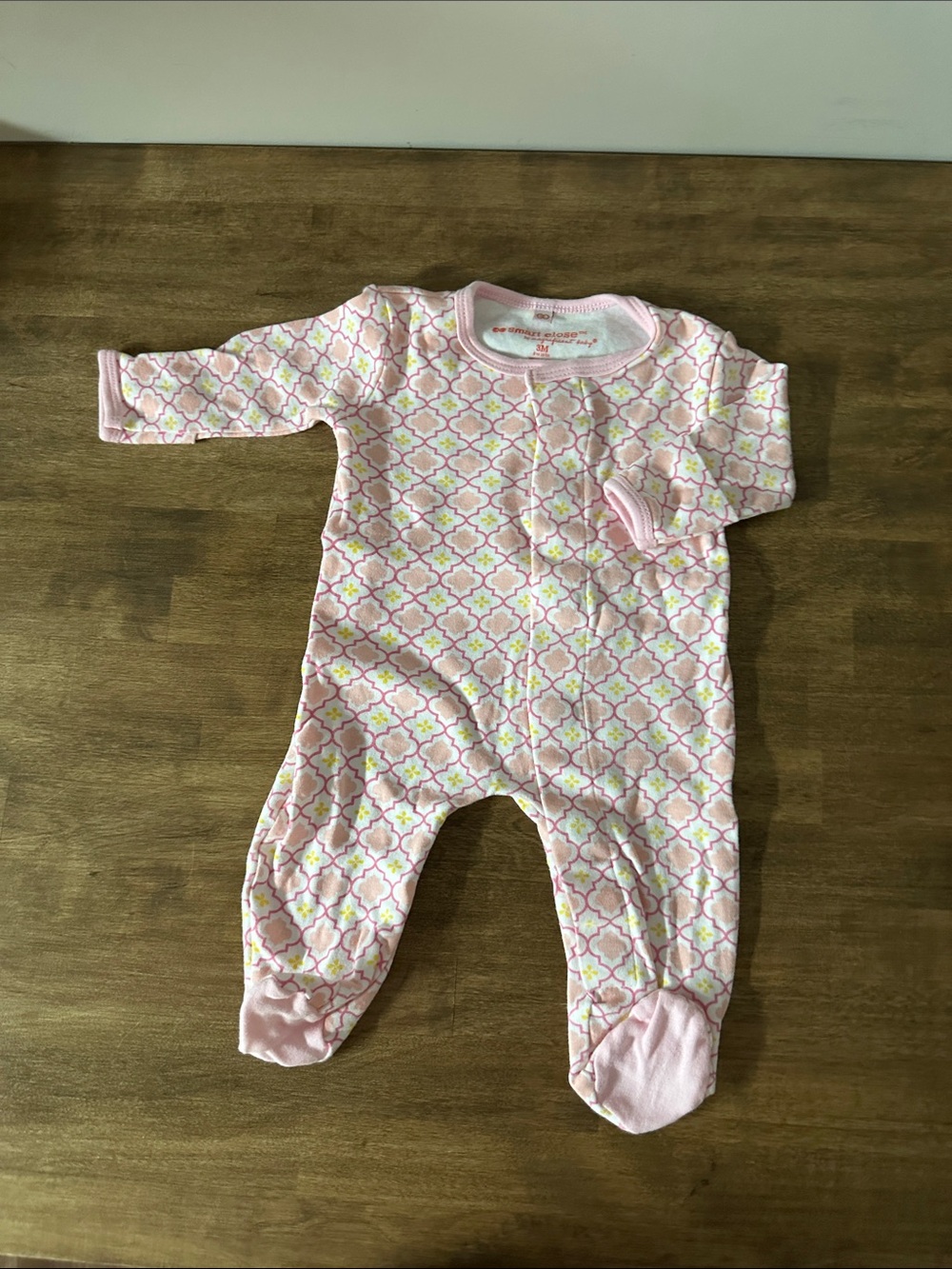 Magnificent Baby Pink & White Geometric Footed One-Piece